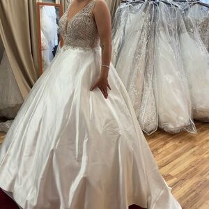 Elegant White Bridal Gown with Beaded Bodice